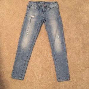 Light wash, a bit distressed, ankle length jeans
